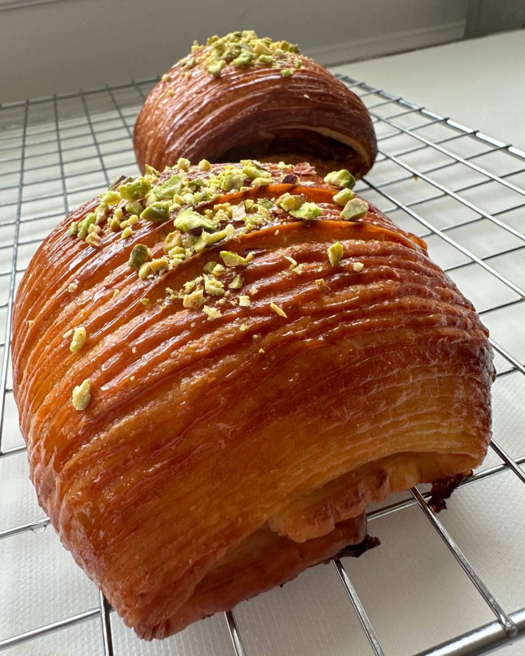 Praline pistachio croissant with white chocolate cream